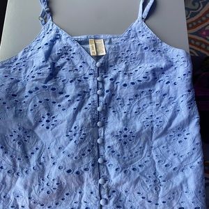 periwinkle tank top with buttons, ruffled bottom,